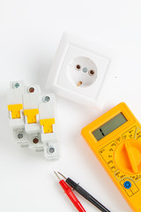 digital multimeter, electrical outlet and circuit breaker
