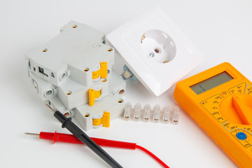 digital multimeter, electrical outlet and circuit breaker