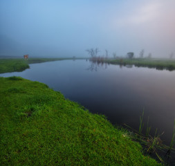 spring morning. foggy dawn. picturesque foggy river
