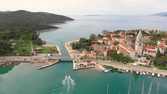 Aerial view of man-made canal crossing the city of Osor, Croatia.