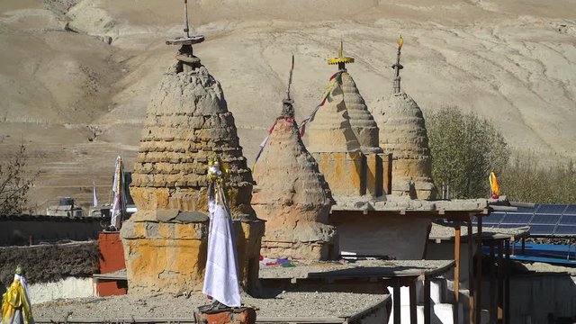 Stupa, prayer flags and ancient buildings in the Himalaya, Nepal