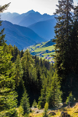 landscape in the tyrolean mountains, view from forest to the navis valley