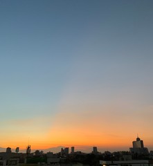 Naklejka premium sunset over city