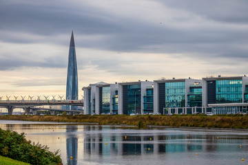 Cityscape with modern buildings and a skyscraper. Architecture and landmarks of the city of St. Petersburg, Russia.