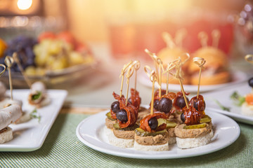 Catering service. Restaurant food canapes table with snack delicious dining