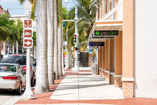 Fort Myers, USA - April 29, 2018: City Town Sidewalk Street During Sunny Day In Florida Gulf Of Mexico Coast, Shopping, Parked Cars