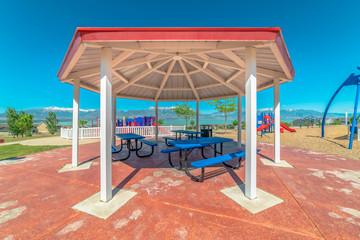 Octagon shape pavilion with scenic Timpanogos mountains and lake background