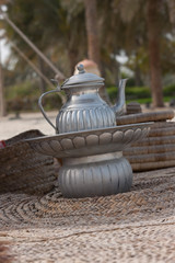 Silver tea pot in bedouin tent