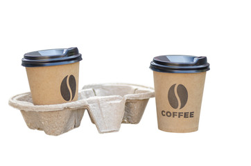 2 disposable cups with cup holder isolated on a white background. brown paper cups with the inscription coffee and the image of coffee beans. advertising blank for coffee houses, coffee shops