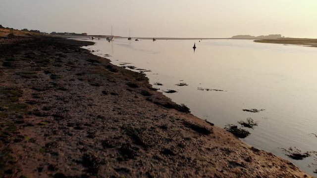 Sea Birds Flying Around Tidal Estuary Norfolk Aerial Drone View, Wells-Next-The-Sea, UK 