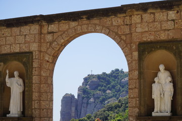 View of cross on top of mountain in Montserrat Spain
