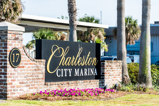 Charleston, USA - May 12, 2018: City Marina sign on street in South Carolina for boating during summer day