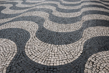 black and white tiled pavement with wavy pattern, Lisbon
