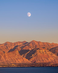 Moon at sunset over Provo canyon and Utah Lake