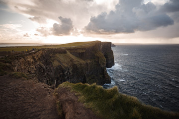 Path of Cliffs of Moher with cloudscape