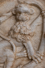 old Architectural detail of frieze with animal 