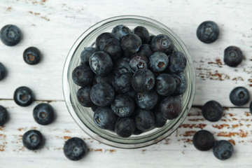 A glass bowl with blueberry