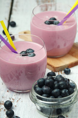 Two glasses with blueberry yogurt