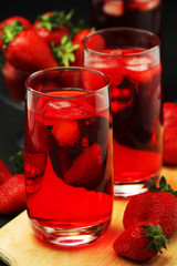 Glasses with strawberry drink with ice	