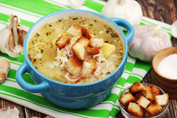 A bowl with traditional Czech garlic soup cesnecka	