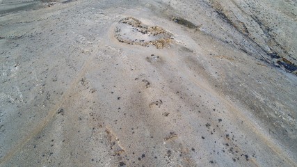 Sunnset between mountains,cliffs and desert landscape