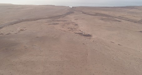 Fototapeta premium Sunnset between mountains,cliffs and desert landscape