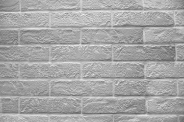 White brick wall background texture. background of an old embossed brick wall