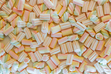 Sweet soft and airy background of marshmallows delicate sweets.