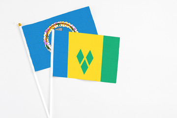 Saint Vincent And The Grenadines and Northern Mariana Islands stick flags on white background. High...
