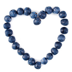 Heart made of blueberry isolated on a white background