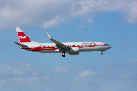 MIAMI, USA - February 17, 2017: A 737 American Airlines painted with a retro livery of Trans World Airlines (TWA) landing at the Miami International Airport.