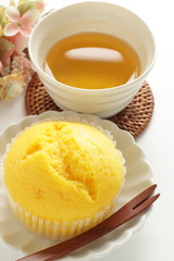 yellow steamed bun on dish for lemon cake image