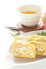 Obraz na płótnie Canvas Japanese food, homemade oba egg roll on dish with copy space