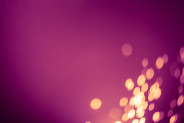 Dark Purple Festive Christmas Beautiful abstract Background with bokeh lights. Holiday Texture with copy space. Can be used as Wallpaper, filling for a website, defocused