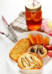 Freshness cut fruit, orange and toast with hashed brown for breakfast