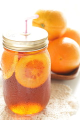 homemade orange jar tea with copy space