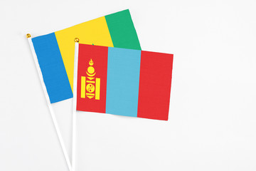 Mongolia and Saint Vincent And The Grenadines stick flags on white background. High quality fabric,...