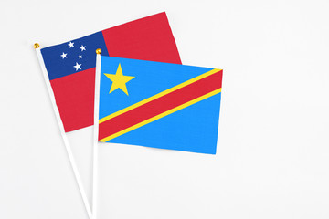 Congo and Samoa stick flags on white background. High quality fabric, miniature national flag....