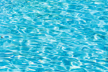 Fototapeta na wymiar Abstract and surface pool water reflect with sun light background