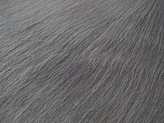 Black dark grey natural seamless stone texture pattern background.