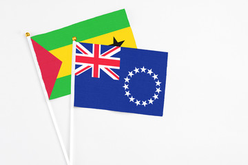 Cook Islands and Sao Tome And Principe stick flags on white background. High quality fabric,...