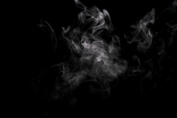 Obraz na płótnie Canvas Abstract powder or smoke effect isolated on black background