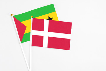 Denmark and Saudi Arabia stick flags on white background. High quality fabric, miniature national flag. Peaceful global concept.White floor for copy space.