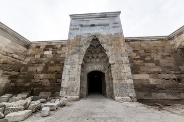 Fototapeta na wymiar Arches and columns in Sultanhani caravansary on Silk Road.