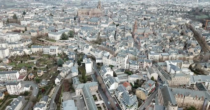 Aerial view of French city of Rodez with tower of Cathedral and spire of church of Saint Amans in autumn day