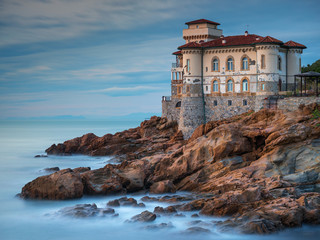 Fototapeta na wymiar silent castle on the rock cliff in twilight time in Livorno in Tuscany in Italy