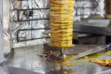 skewer for doner kebab shawarma. fast food fat draining