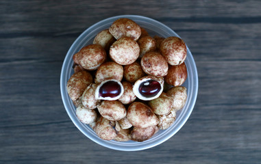 Bambara groundnut or Vigna subterranea (Kacang Bogor) on wood background.