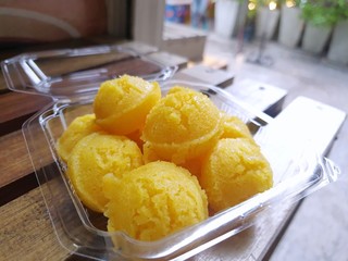 Selective focus of toddy Palm Cake on wooden table, Ready to eat, Thai dessert style (Kanom Tarn)