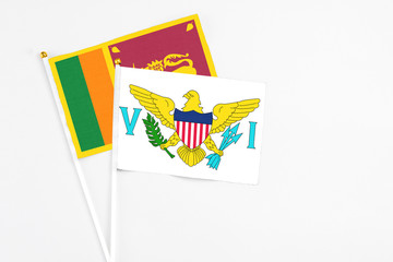and Sri Lanka stick flags on white background. High quality fabric, miniature national flag. Peaceful global concept.White floor for copy space.